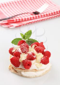 Pancakes with sweet creamy cheese and fresh raspberries