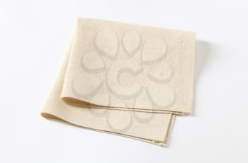 Small folded linen napkin - studio shot