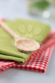 Wooden spoon and table linens