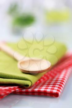 Wooden spoon and table linens