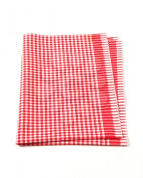 Red and white table linen isolated on white