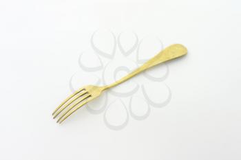 Vintage dinner fork covered with tarnish