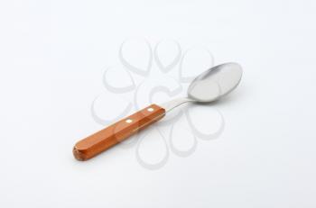 Teaspoon with a wooden handle