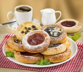 Poppyseed, Cheese and Jam Cakes and a Cup of Coffee