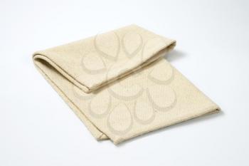 Small folded linen place mat