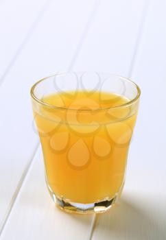 Glass of orange juice - closeup