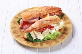 Sub sandwiches with cheese and ham