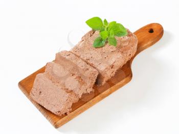 Slices of chocolate halva on cutting board