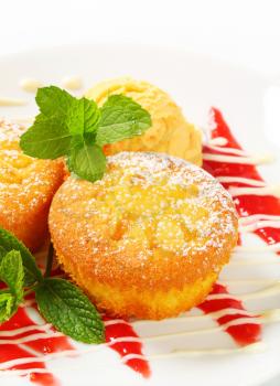 Custard filled muffins with scoop of ice cream