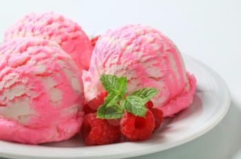 Scoops of raspberry yogurt ice cream 
