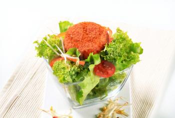 Green salad with fried breaded cheese 