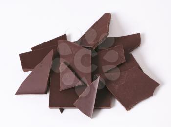 Pieces of dark chocolate - studio shot
