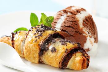 Chocolate chip croissant and scoop of vanilla chocolate ice cream