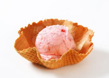 Pink ice cream in a waffle basket
