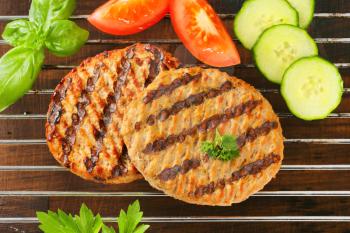 Grilled patties on barbecue grid
