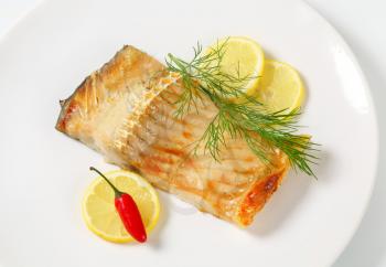 Oven baked carp fillet with lemon and dill