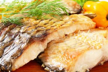 Oven baked carp fillets with dill
