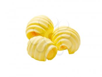 Curls of fresh butter isolated on white