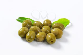 Unpitted brine cured green olives