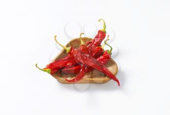 Dried Red Chili Peppers in wooden bowl