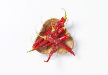 Dried Red Chili Peppers in wooden bowl