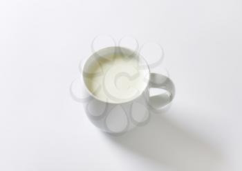 Fresh milk in white mug
