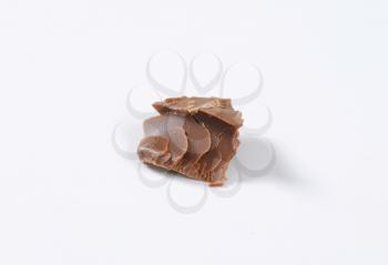 piece of chocolate on white background