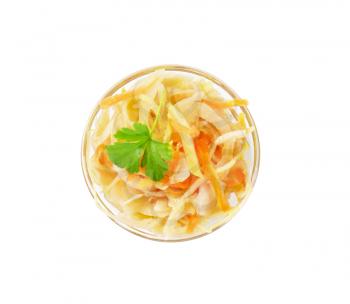 Bowl of pickled cabbage salad isolated on white
