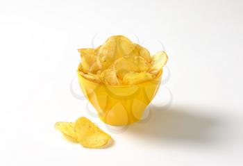 Heap of potato chips in a bowl