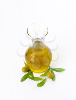 Olive oil in clear glass carafe