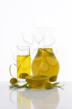 Olive oil in clear glass serving vessels