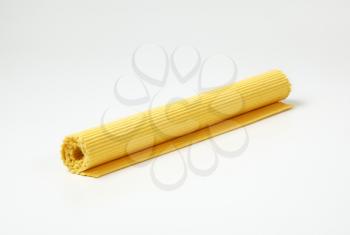 yellow ribbed cotton placemat, rolled up