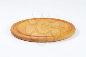 round wooden cutting board with juice well