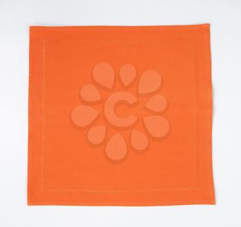 Orange napkin on white background
