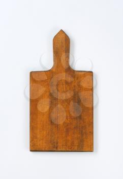 dark wood paddle cutting board