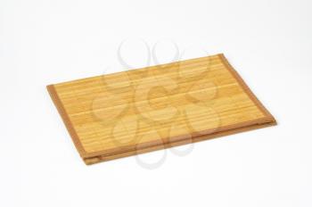 Bamboo place mat with brown border