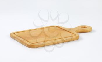 paddle cutting board with groove
