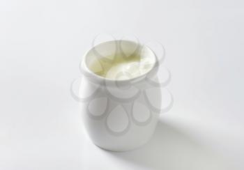 cup of milk kefir on white background