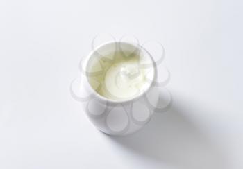cup of milk kefir on white background