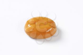 caramel candy on white background