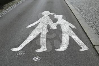 children crossing sign on the road