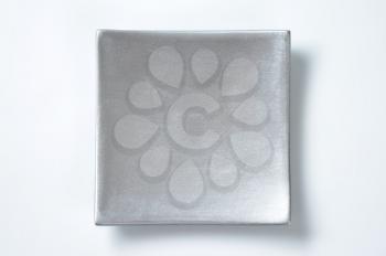 square silver plate on white background