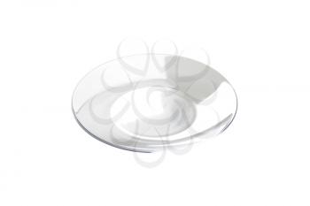 Empty transparent plate with wide rim