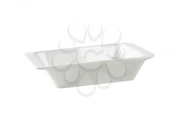 Deep rectangular porcelain dish isolated on white