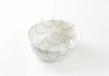 Empty round white serving bowl