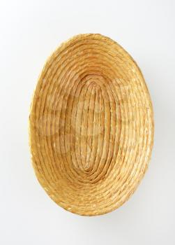 Empty oval straw bread basket