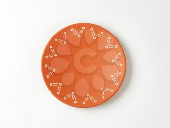 Single decorative terracotta dinner plate