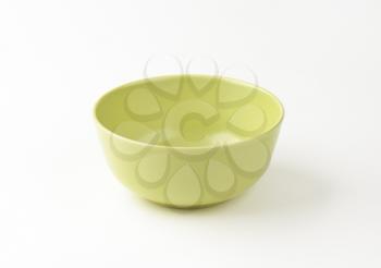 empty green bowl on white background