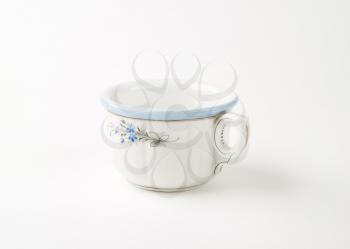 hand painted rustic tea cup on white background