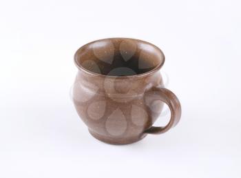 empty handcrafted coffee cup on white background